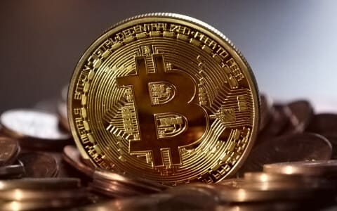 Golden Bitcoin coin representing cryptocurrency investments